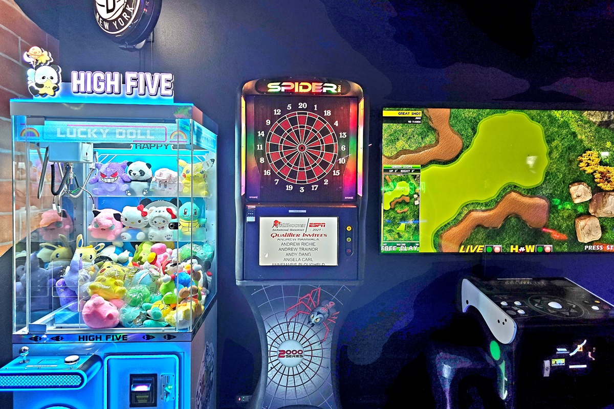 All arcade games are free play except for the claw arcade ($1/game) where you have the chance to win prizes. Darts by Spider is loaded with 45+ dart games!