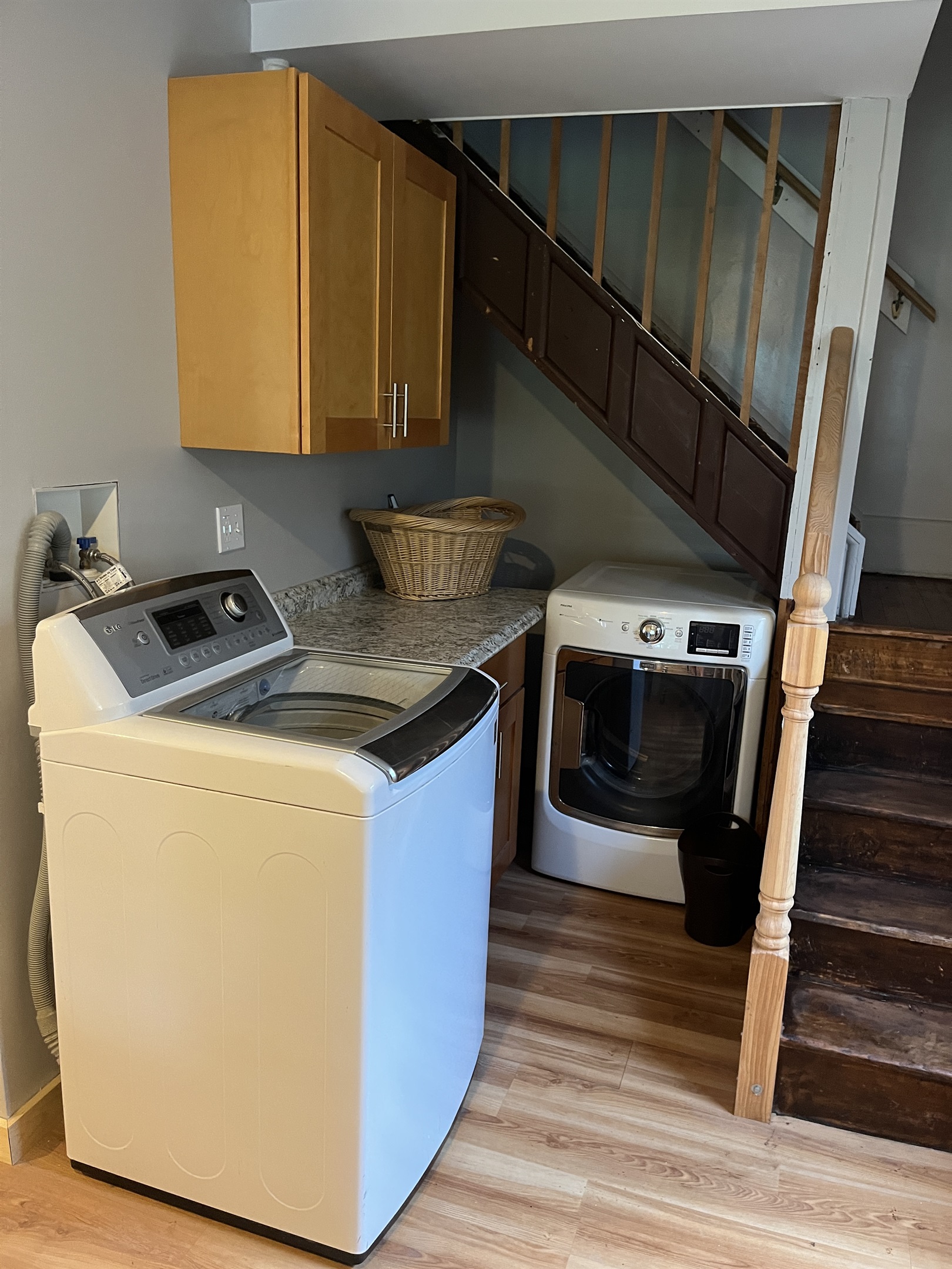 Laundry area with 2nd set of stairs to 2nd floor