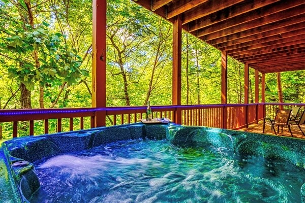 Hot tub outside game room, downstairs patio
