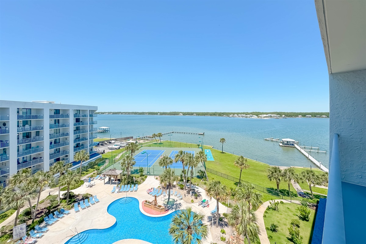 Resort-style living awaits. Enjoy our lush tropical courtyard featuring a sparkling pool, updated tennis and pickleball courts, and shuffleboard—all steps from the sand.