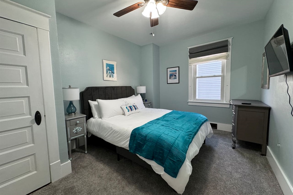 The Santorini Room is a calm and relaxing refuge on the Main Level offering a Queen Bed and Roku smart TV.