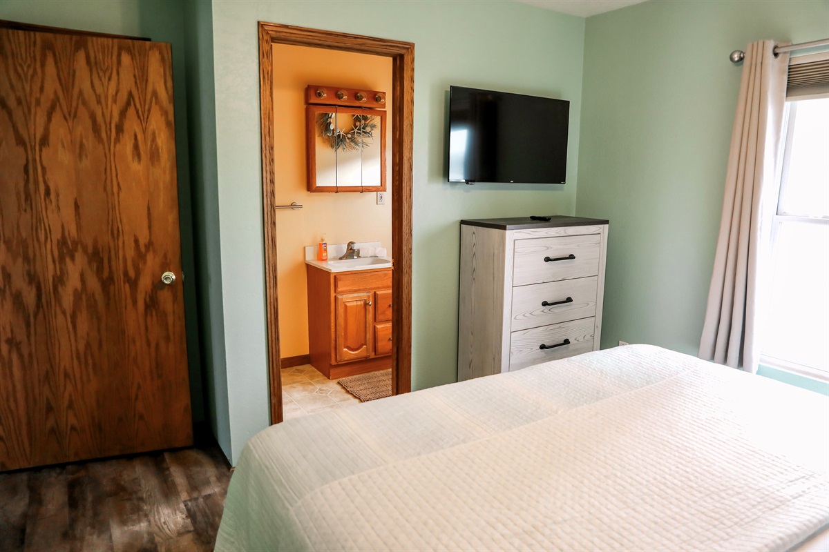 [Half Bathroom] Located in Bedroom #1.