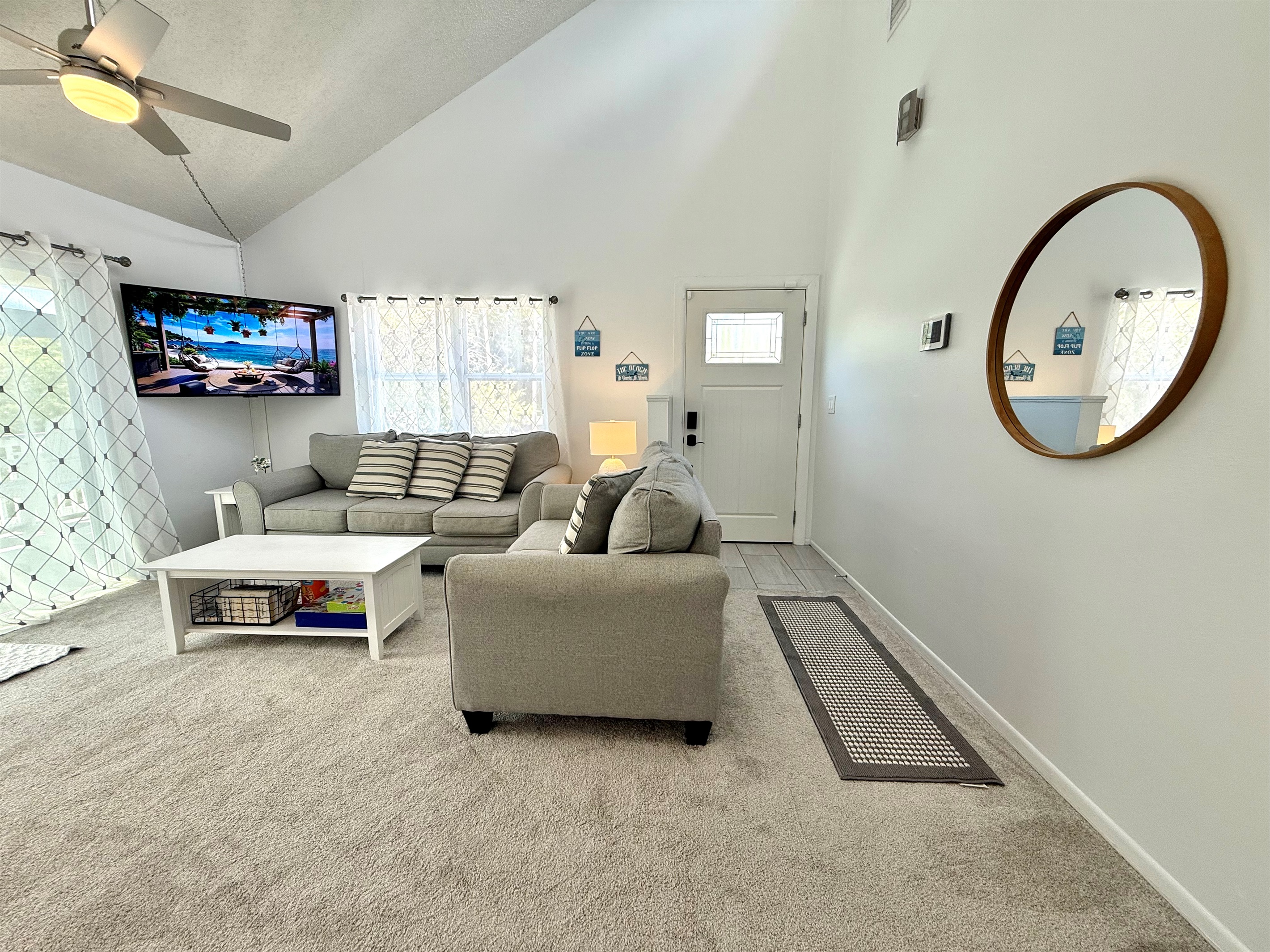 Seamlessly connected to the dining area, this open-concept living room is perfect for family gatherings, movie nights, or game nights.