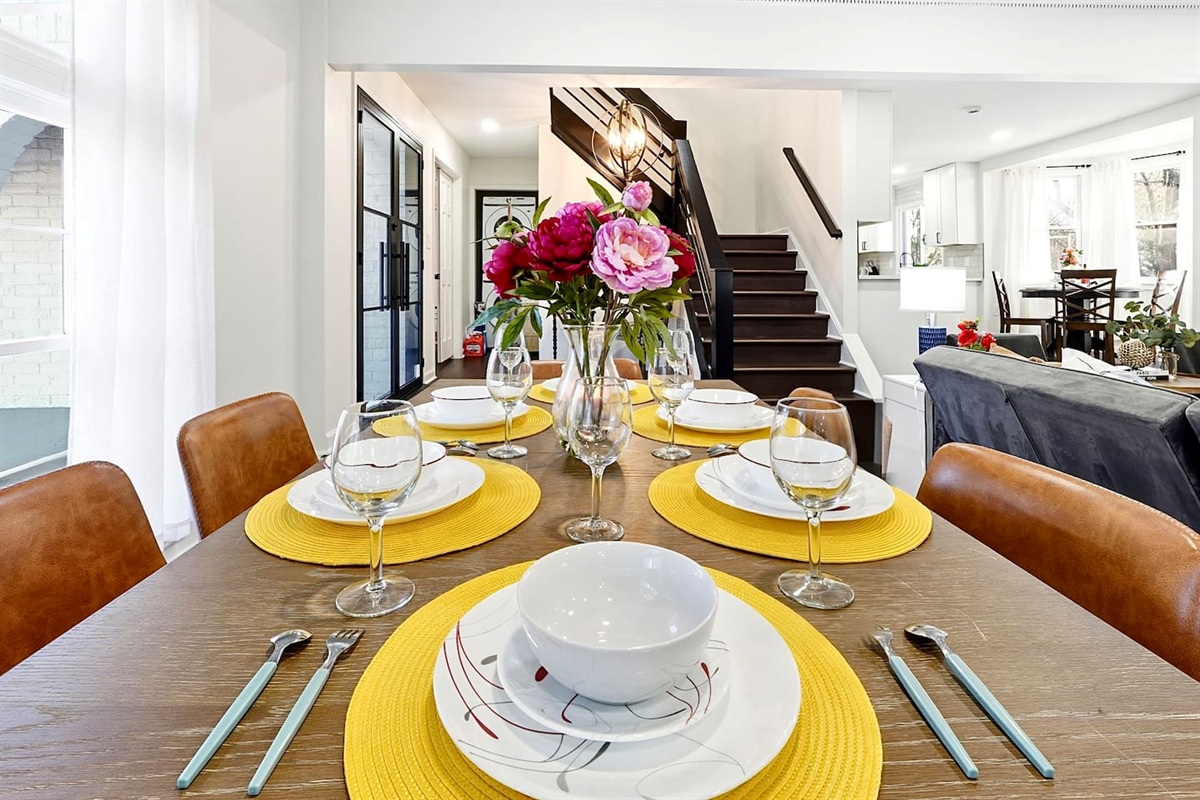 Charming wooden dining area comfortably seating up to 6 guests. Perfect for sharing meals, laughs, and creating lasting memories.