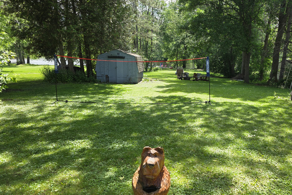 Large spacious yard with lots of room for badminton, soccer, croquet, bocce ball, etc.