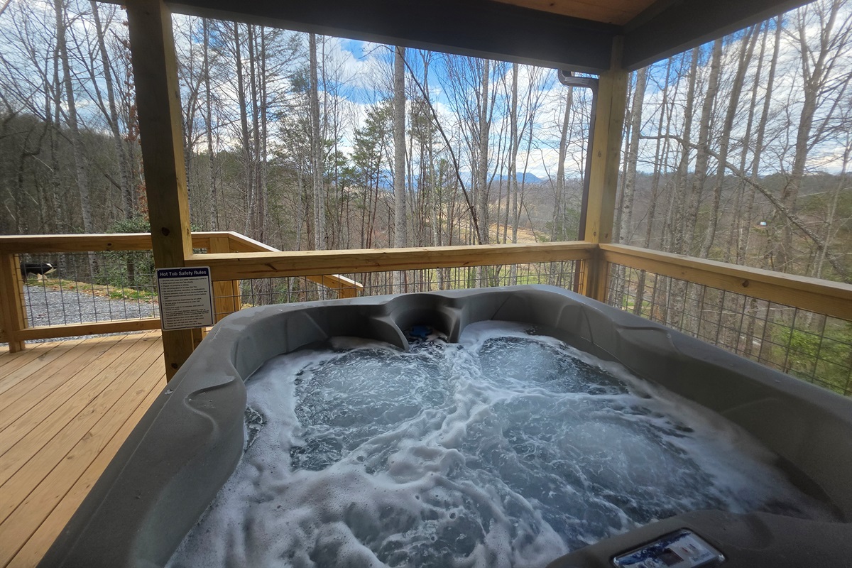4 person hot tub on the covered porch.