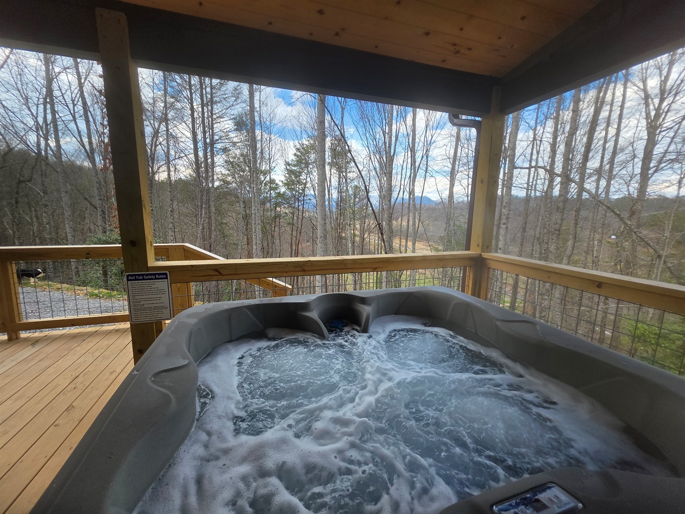 4 person hot tub on the covered porch.