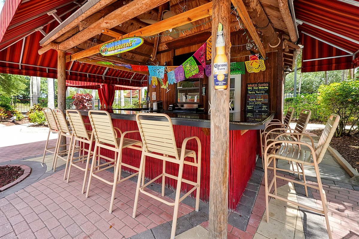 Meet new friends at the community Tiki Bar—a guest-favorite spot for happy hour and social gatherings, conveniently managed by the clubhouse staff 