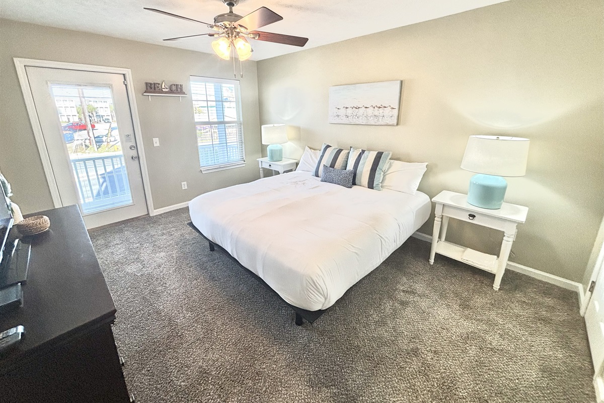 Master bedroom with private balcony!