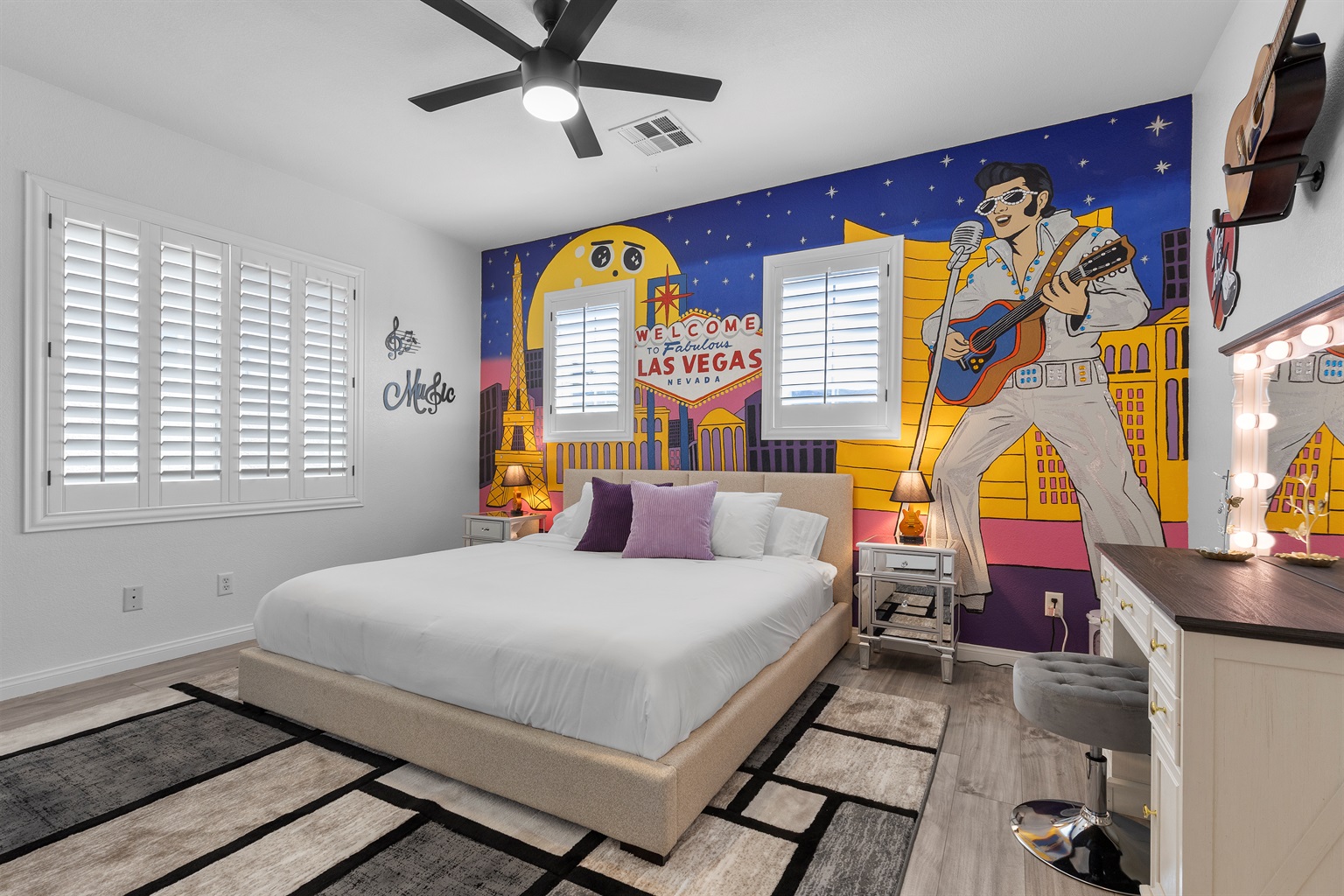 Famous Las Vegas performers themed bedroom with a King bed and custom hand-drawn artwork.  All bedrooms have a 55" 4K TV. It’s Showtime!