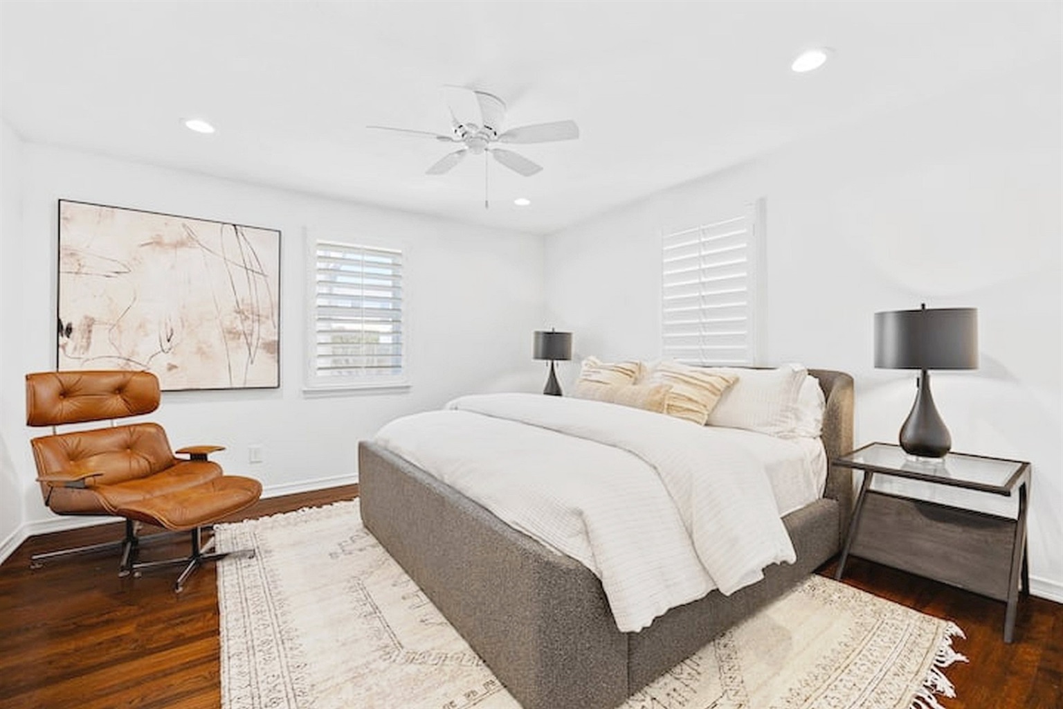 Bright, calming retreat with plush bedding, designer touches, and modern comfort.