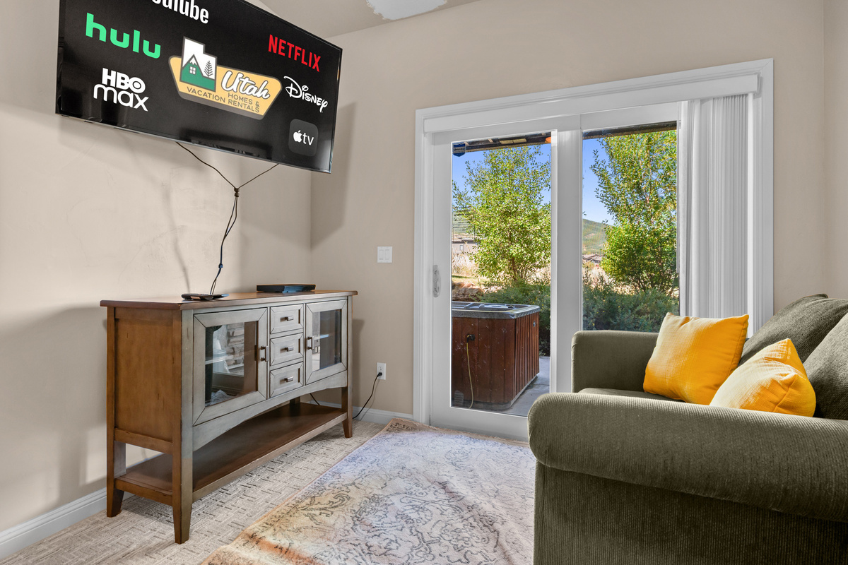 Enjoy movies or your favorite streaming services from the cozy sitting area.