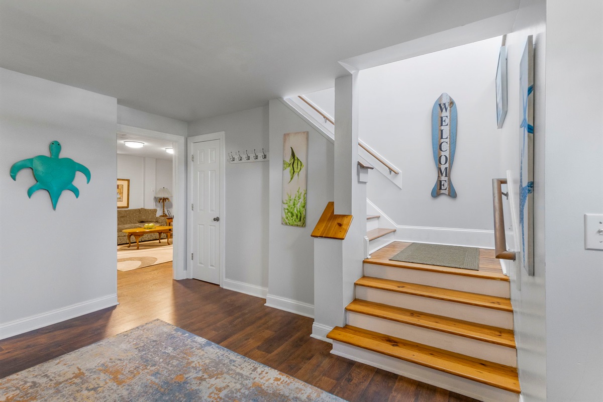 Entry from Driveway. The ground floor also has a media room and a game room.