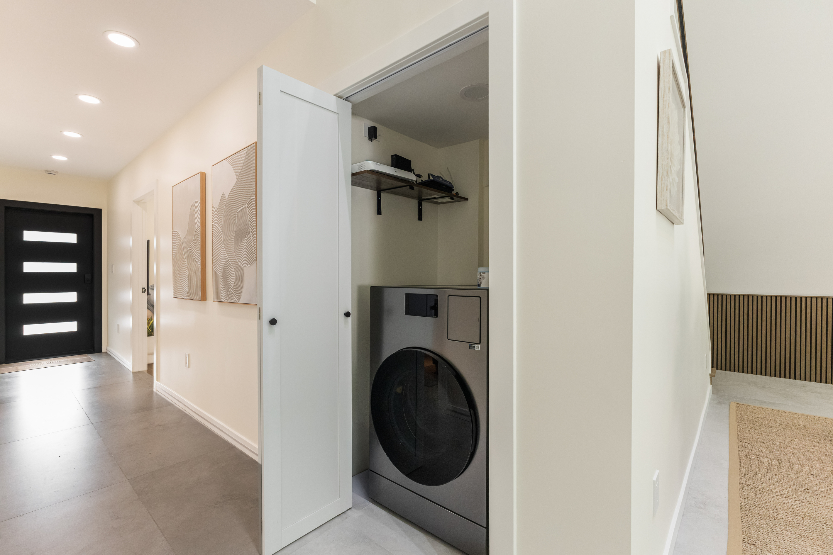 All-in-one washer and dryer, tucked away
