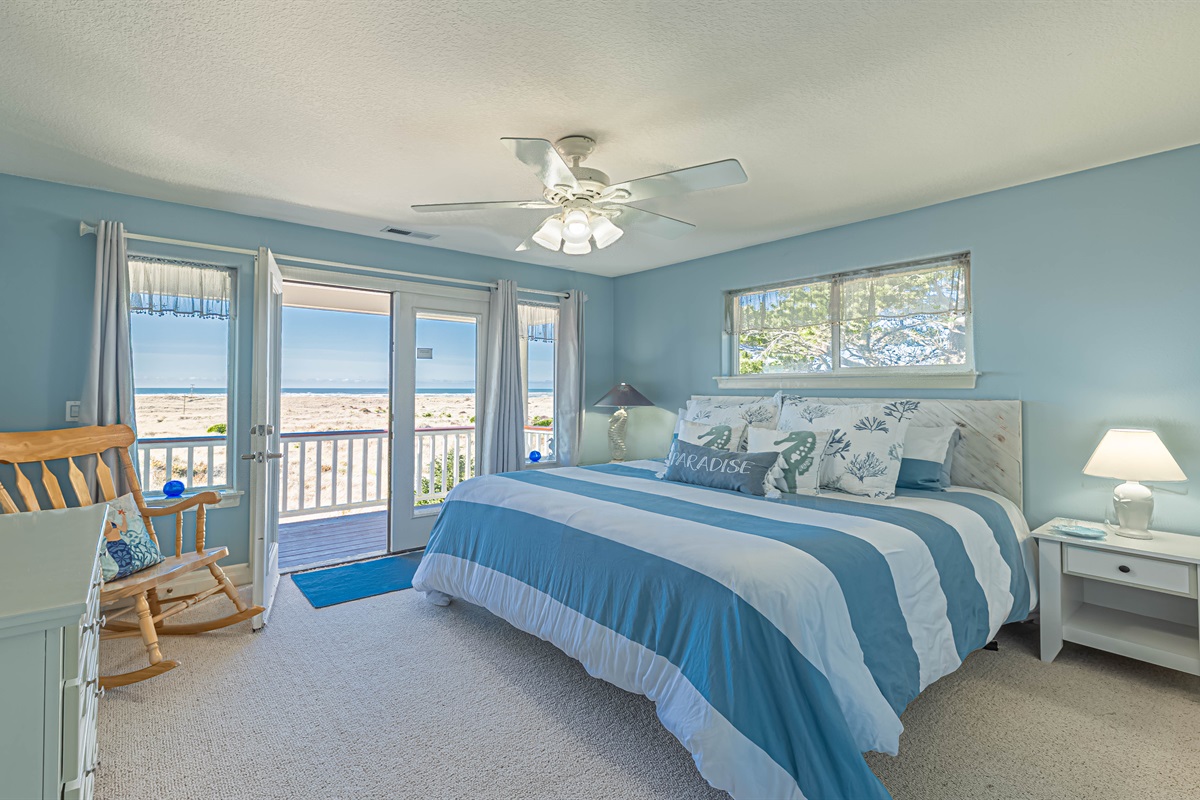 "Crew's Quarter's" bedroom on top (3rd floor) has amazing ocean views.  This bedroom has a King size memory foam mattress, 55" TV and French doors leading out to the 3rd floor deck with astounding ocean views!!