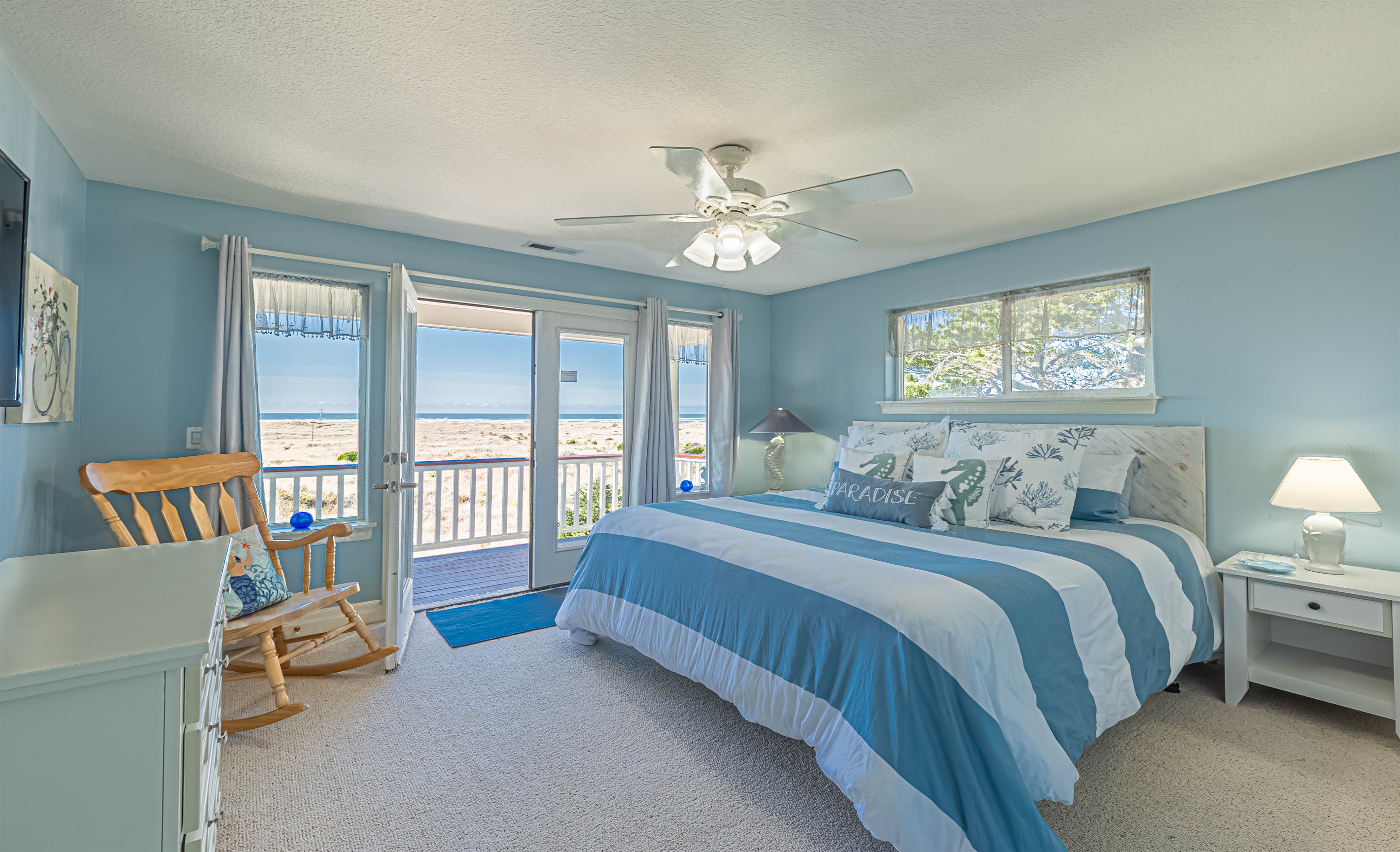 "Crew's Quarter's" bedroom on top (3rd floor) has amazing ocean views.  This bedroom has a King size memory foam mattress, 55" TV and French doors leading out to the 3rd floor deck with astounding ocean views!!