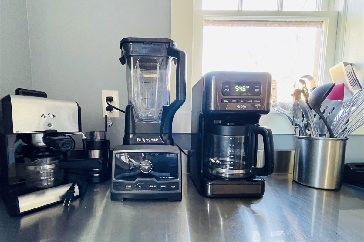 Some of the appliances for use in the kitchen. On the left is an espresso maker