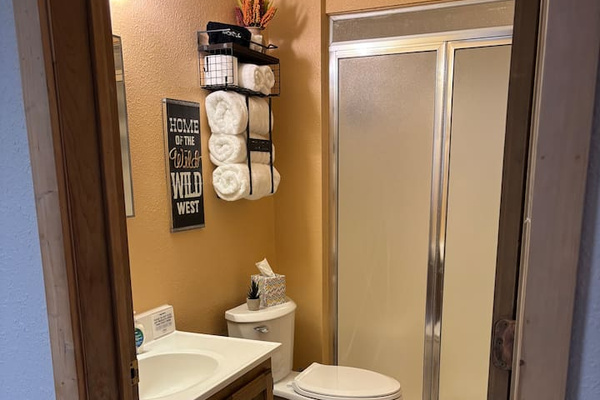 Main bathroom located off the dining room/kitchen.  Shower with shampoo, conditioner and body wash provided