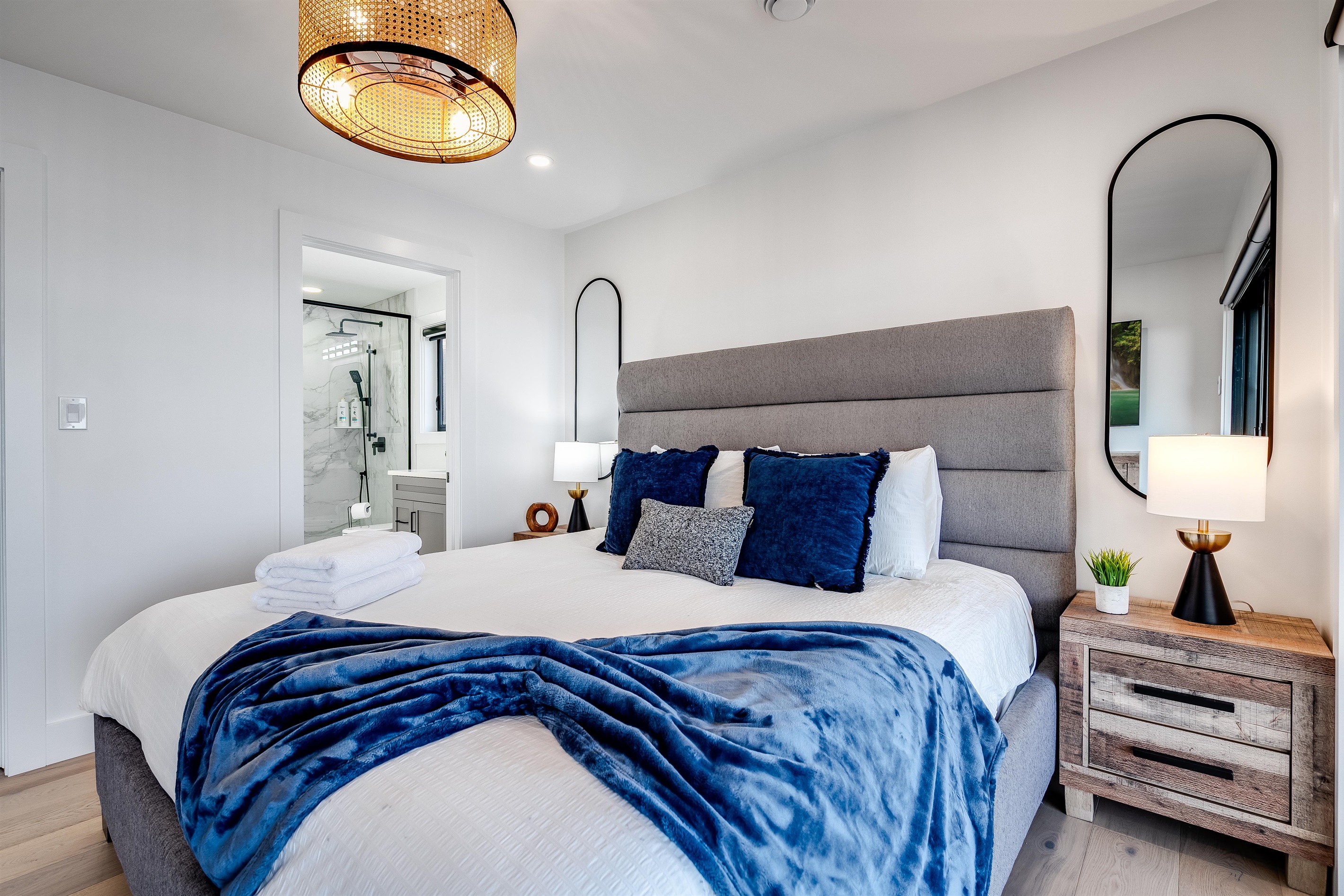 King Bedroom with Crisp white walls frame a serene bedroom retreat.