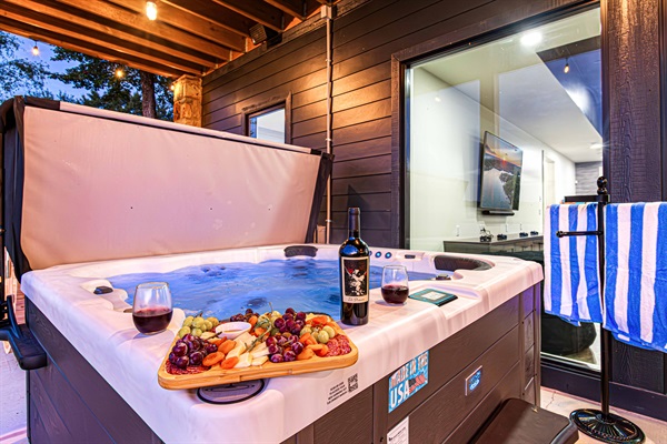 Pour a glass, press play, and let the bubbles do the rest—this spa setup was made for you to kick back, reconnect, and soak in the good life.