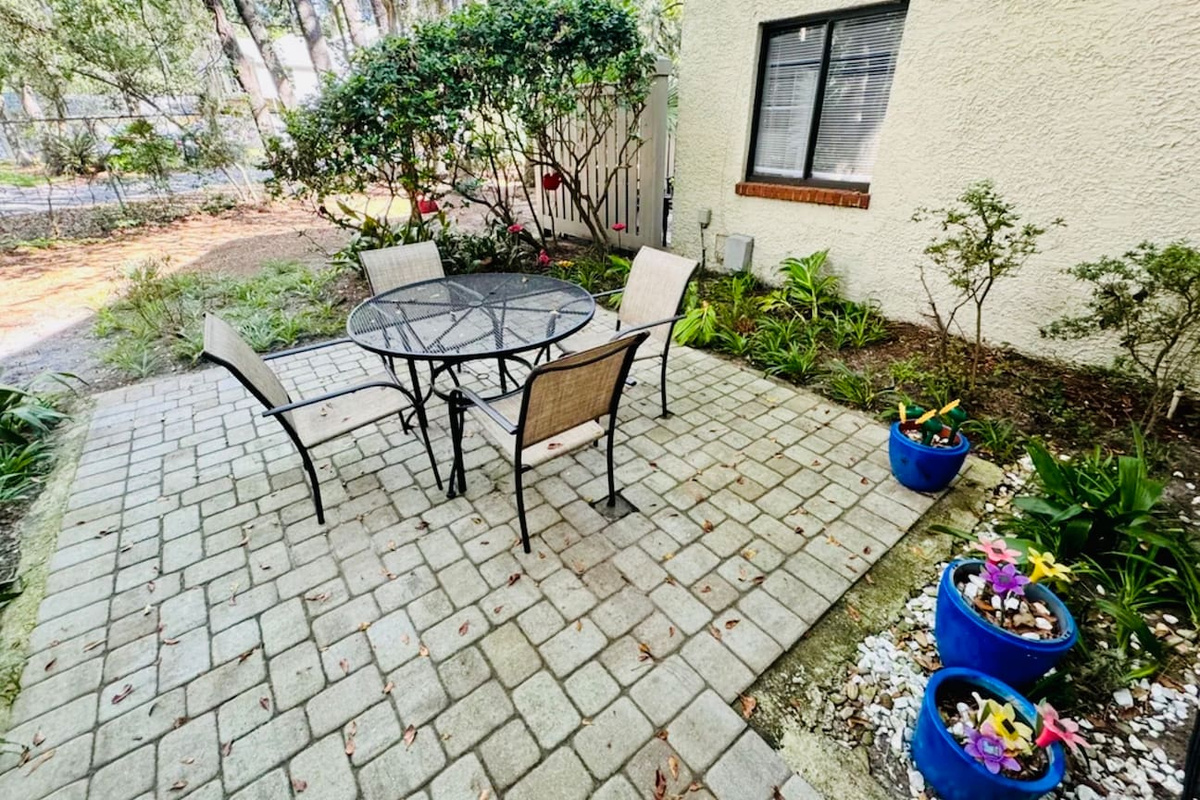 Patio with bistro table and flowers