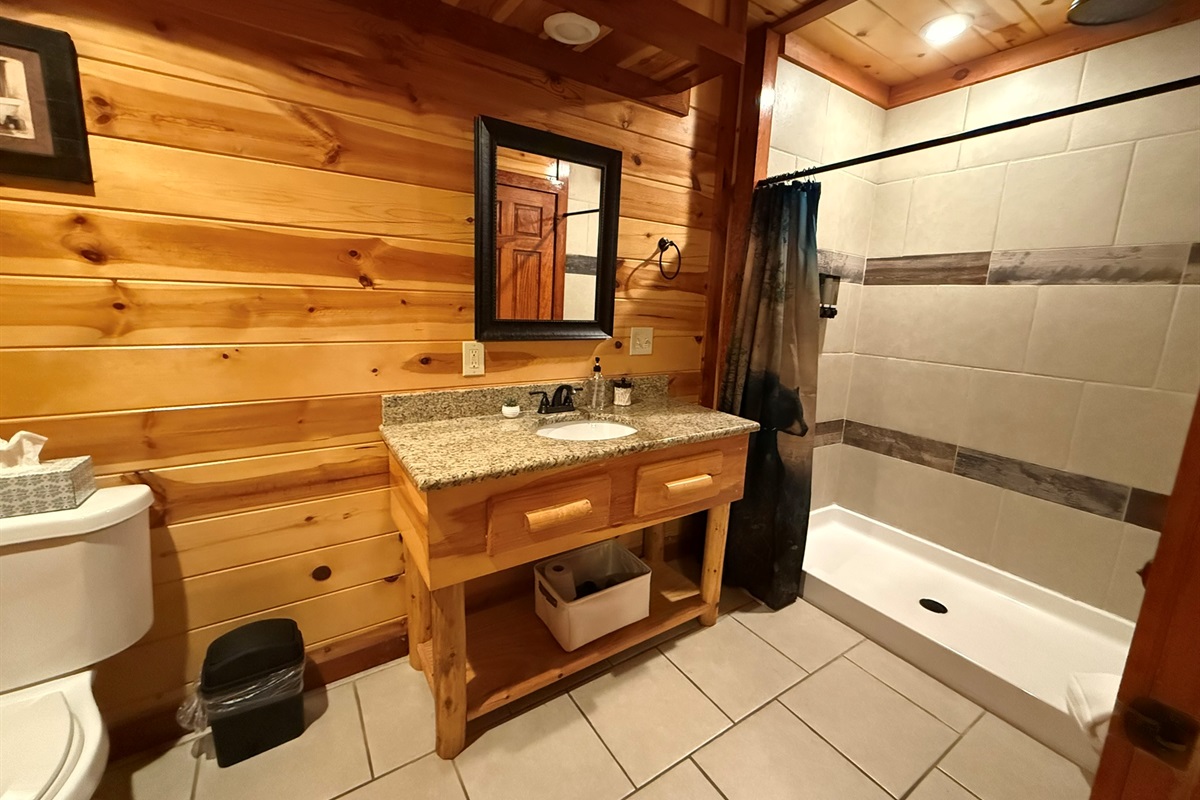 Enjoy a spa-inspired shared ensuite bathroom between the second and third king bedrooms, complete with a luxurious dual rainfall shower.