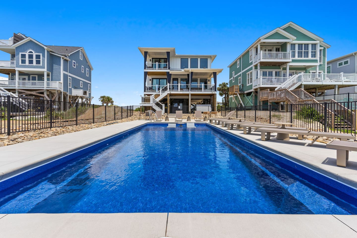 Welcome to Zen, Oak Island’s newest luxury oceanfront retreat. Designed with large groups in mind, this one-of-a-kind home blends resort-style amenities, spacious gathering areas, & private suites to create the ultimate setting for your next getaway.