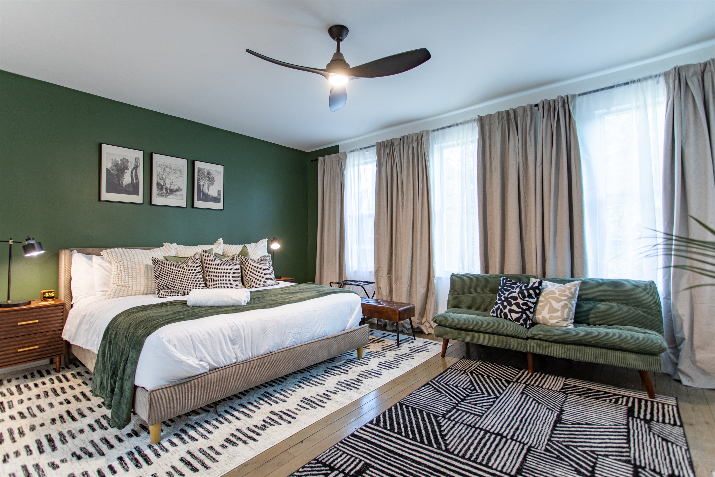Master bedroom with king bed, twin futon for extra sleeping space, and ensuite bathroom.