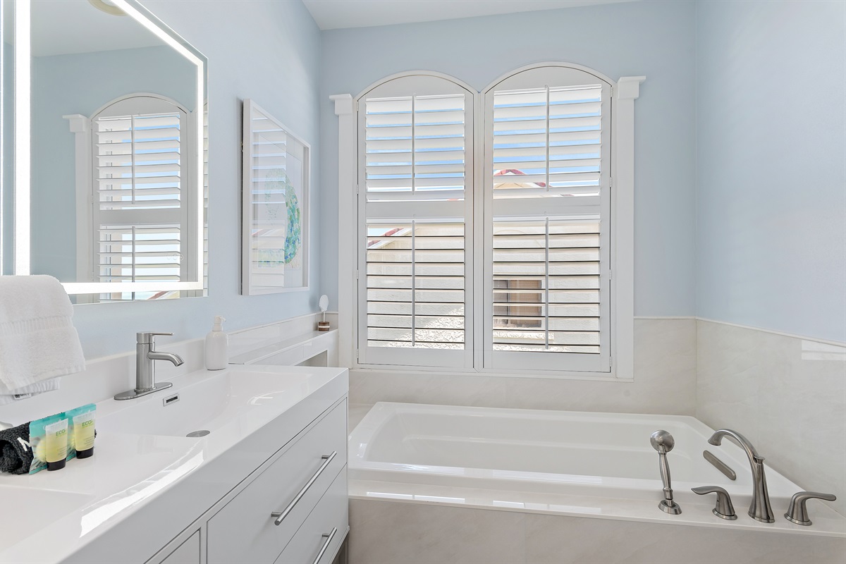 Primary Bathroom Soaker Tub and Double Vanity Area