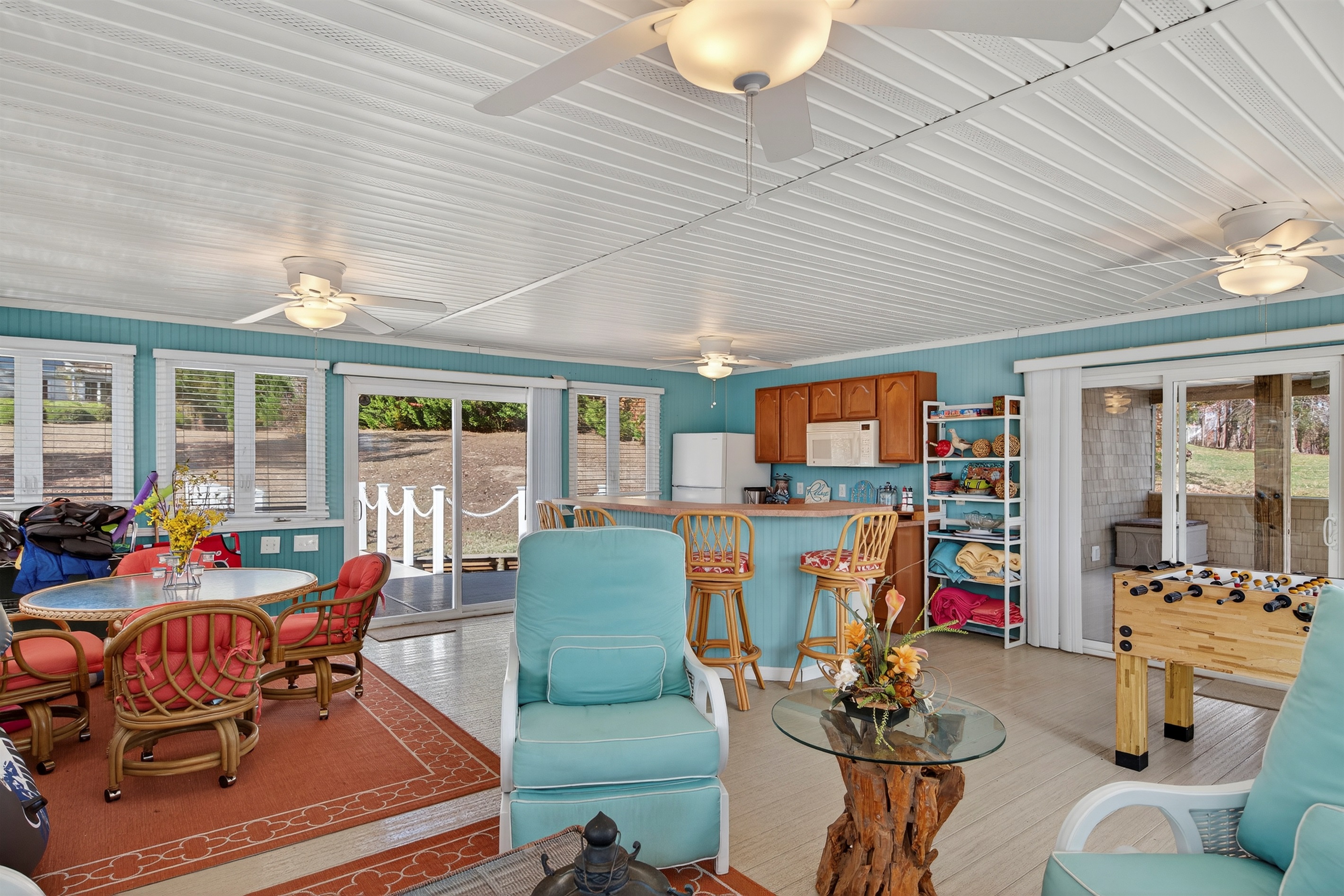 A bright, open boathouse designed for relaxing, entertaining, and enjoying the lake all day long.