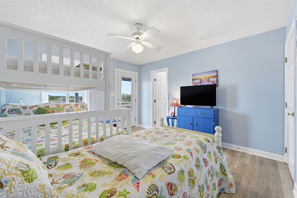 Bunk room built for fun—watch TV, then head straight to the deck or down to the dock for outdoor fun