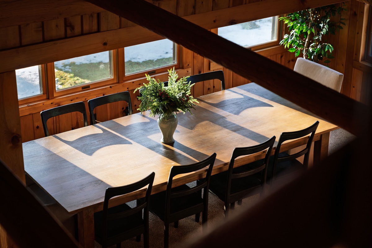 The sun streams in from the lake in the afternoon, washing the main living area for the golden hour.