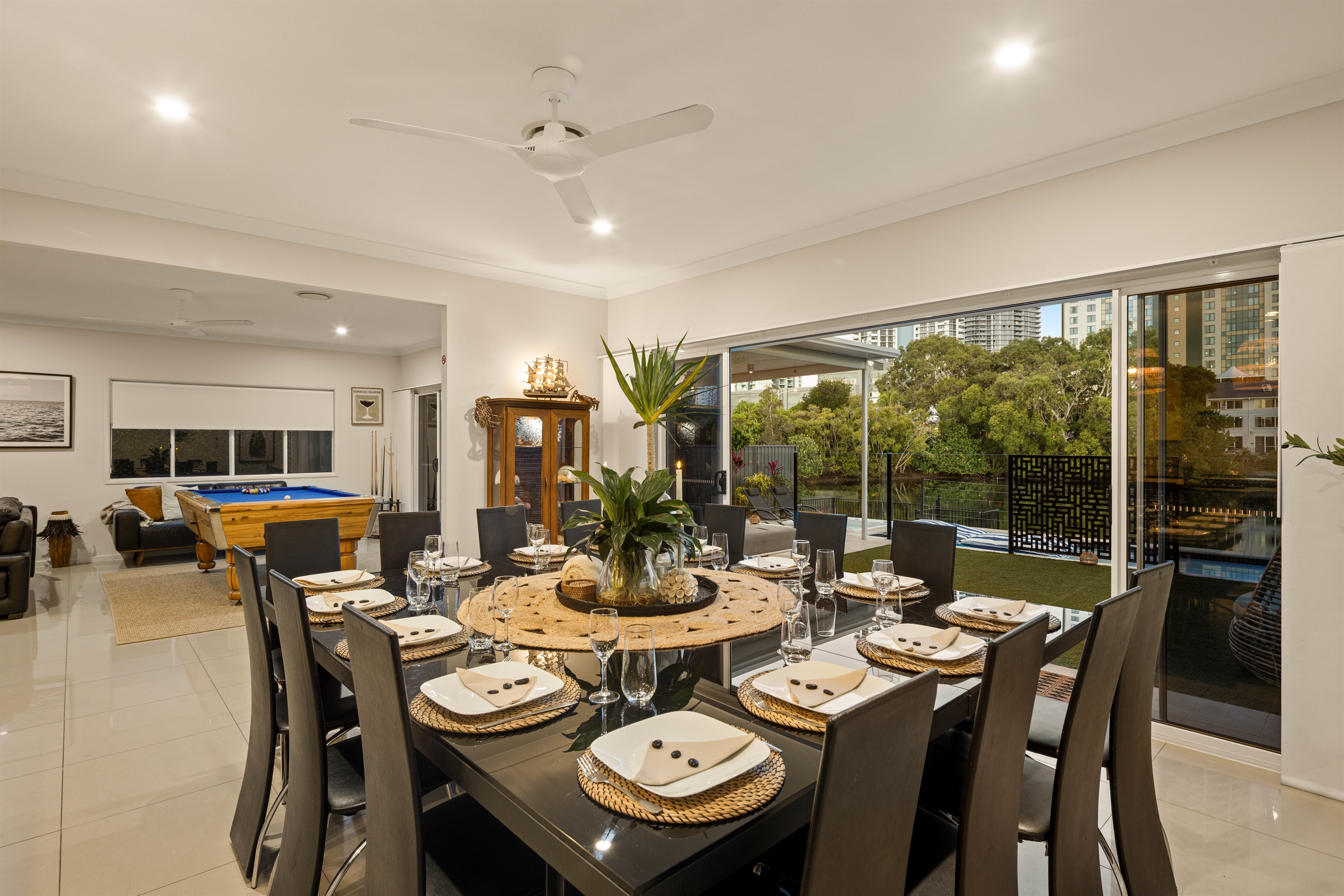 Elegant dining setting overlooking the waterfront, perfect for shared celebrations.